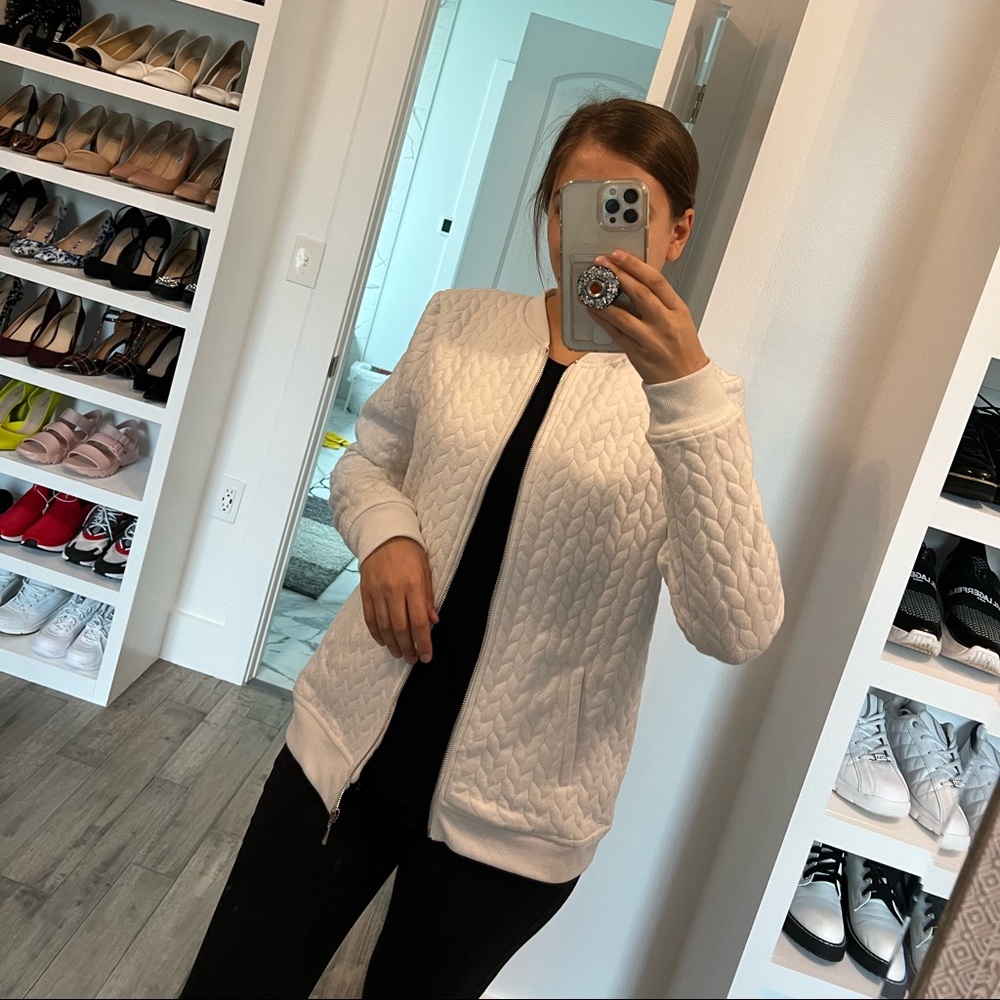Cathy Daniels white jacket